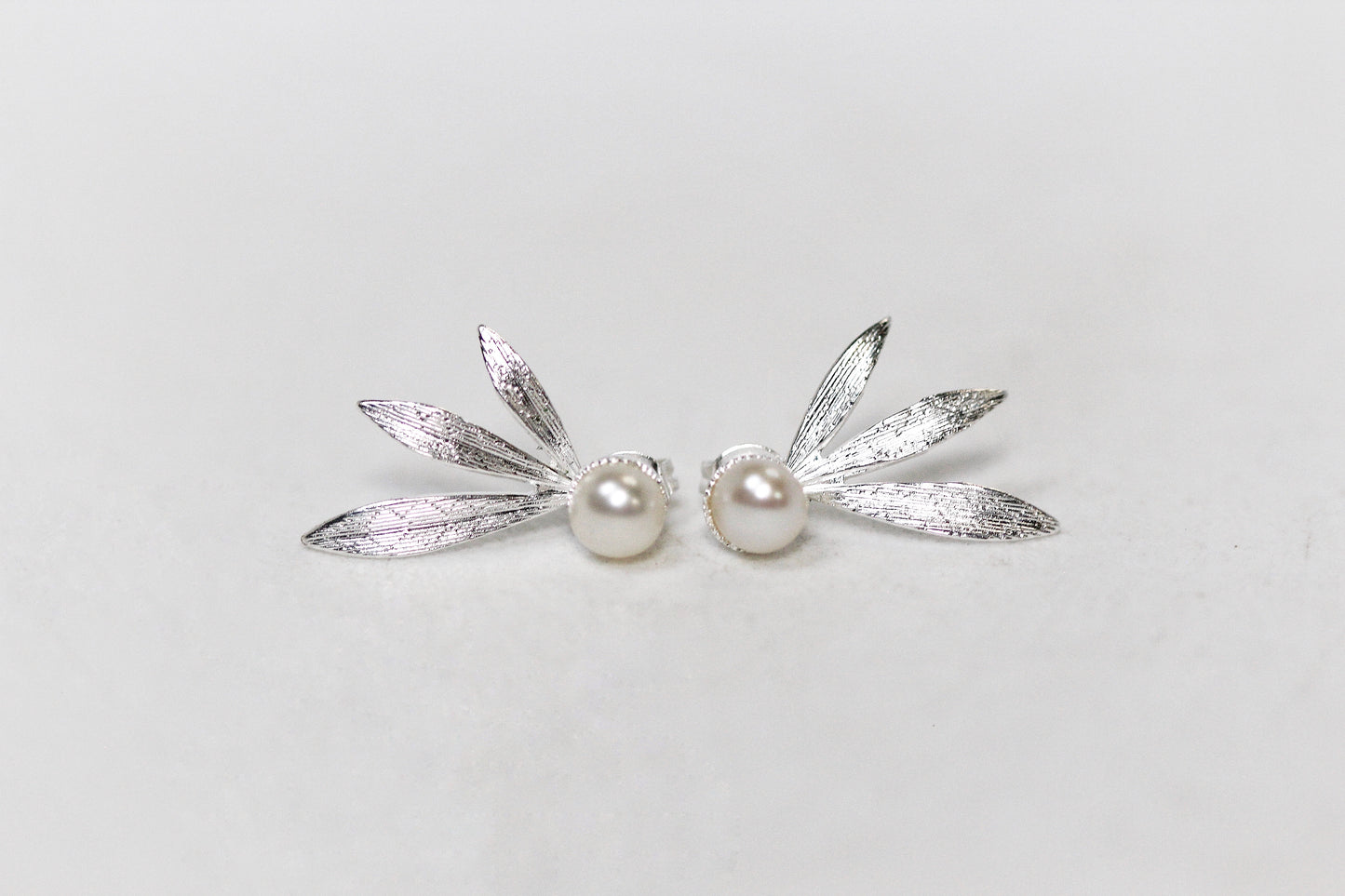 Jacki Stud & Jacket Earrings